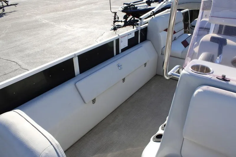 Slide: The Image of 2021 SunCatcher Select 22C pontoon boat interior with seating and console details. - 9