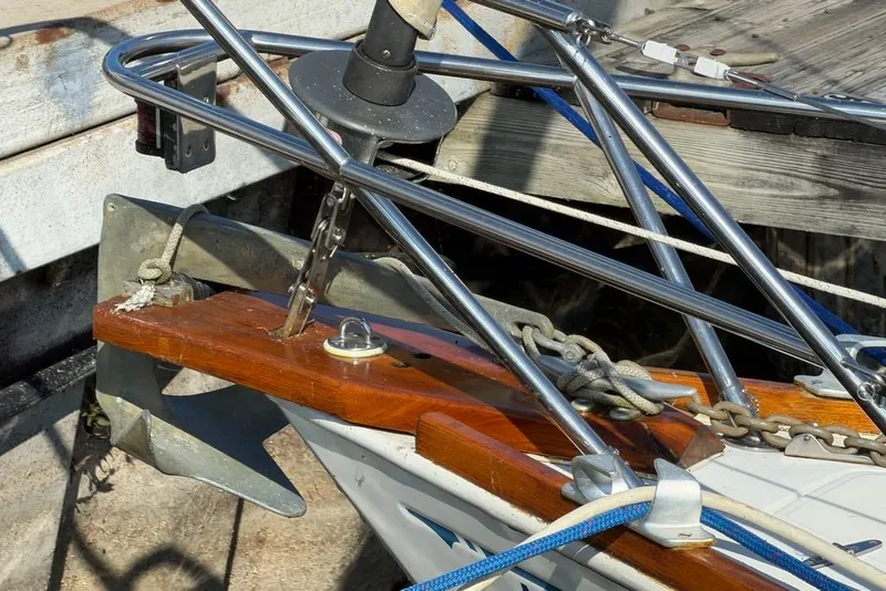 Slide: The Image of 1984 Sabre 34-1 sailboat deck with rigging and mast in marina setting. - 15