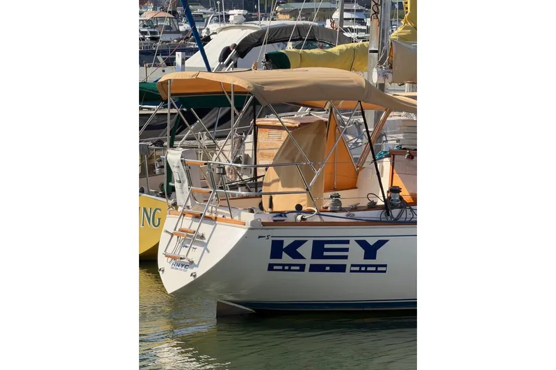 Slide: The Image of Interior view of a 1984 Sabre 34-1 sailboat with tan canopy and hatch. - 18