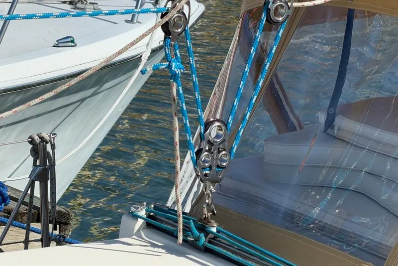 Slide: The Image of Close-up of 1984 Sabre 34-1 sailboat deck with winch and ropes. - 21