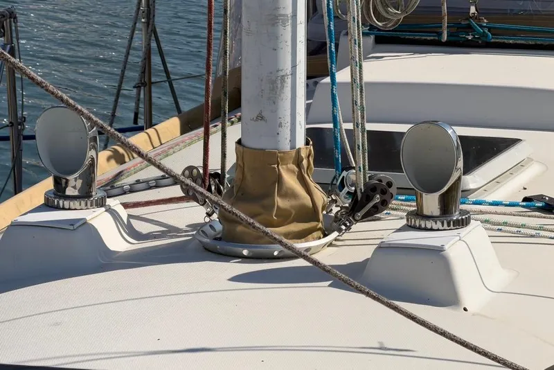 Slide: The Image of 1984 Sabre 34-1 sailboat deck with rigging and chrome vents. - 28