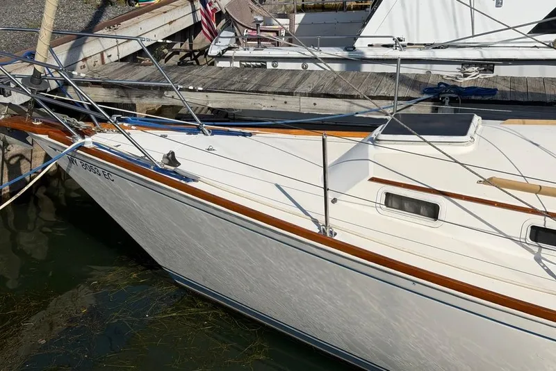 Slide: The Image of 1984 Sabre 34-1 sailboat deck with rigging and windows. - 3