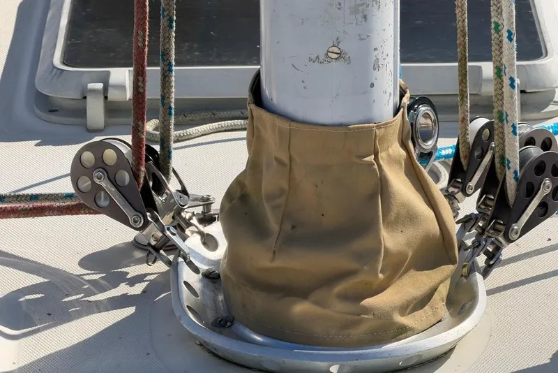Slide: The Image of Close-up of 1984 Sabre 34-1 sailboat mast with rigging and pulleys. - 30