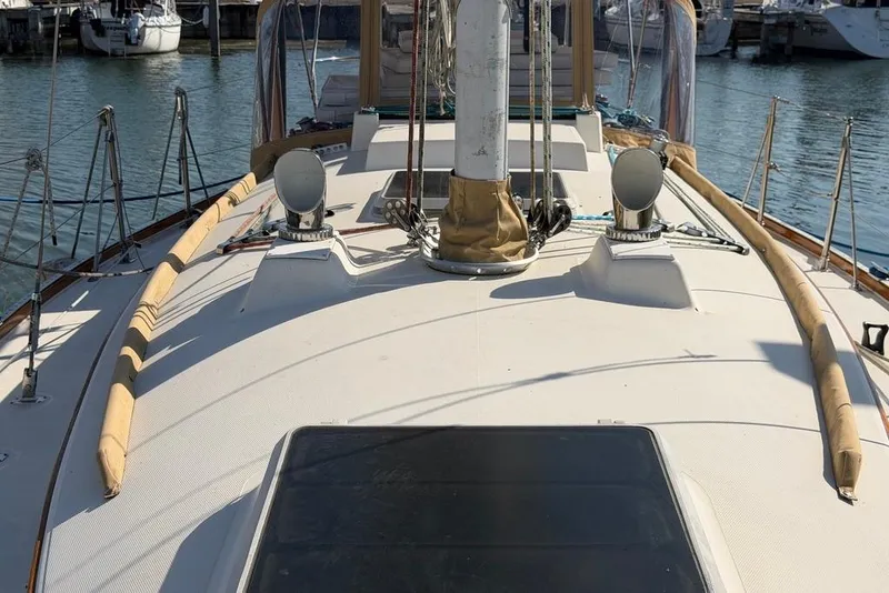 Slide: The Image of 1984 Sabre 34-1 sailboat deck view, docked in a marina. - 37