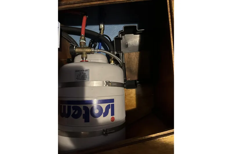Slide: The Image of Propane tank installation in 1984 Sabre 34-1 sailboat interior compartment. - 69