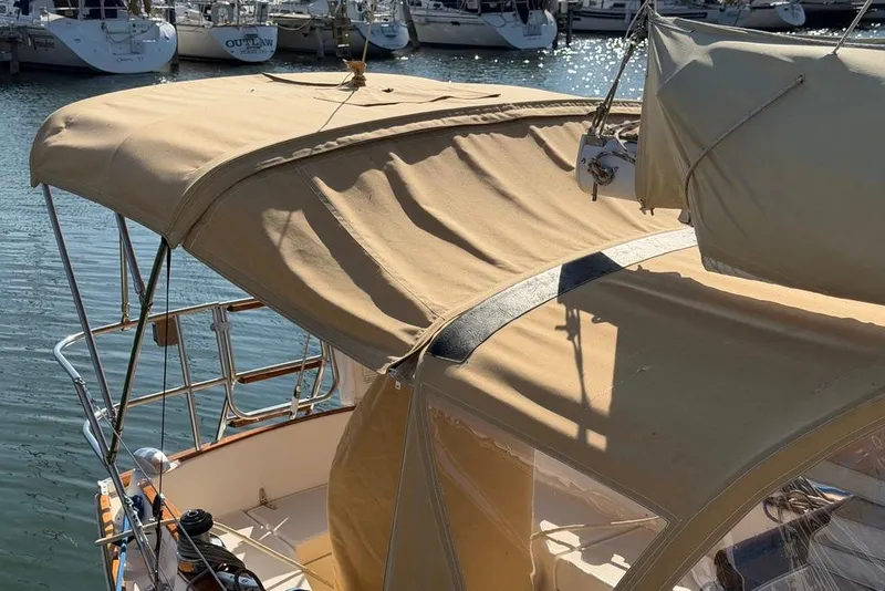 Slide: The Image of 1984 Sabre 34-1 sailboat deck with mast and rigging in marina. - 8