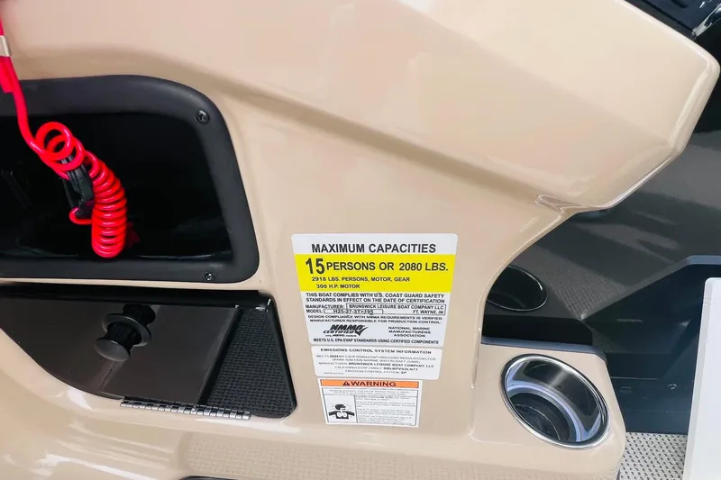 Slide: The Image of 2024 Harris Sunliner 250 boat capacity label, 15 persons or 2080 lbs, safety compliance. - 22