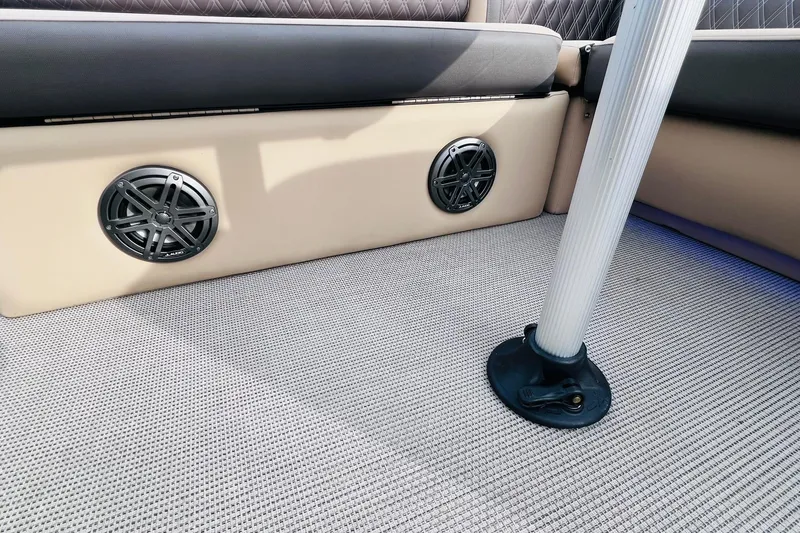 Slide: The Image of 2024 Harris Sunliner 250 interior with speakers and textured flooring. - 41
