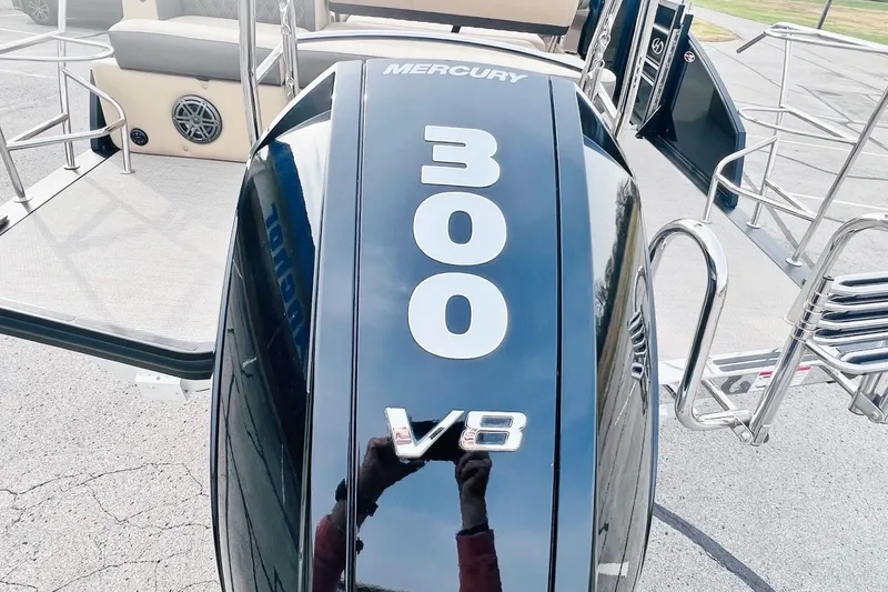 Slide: The Image of 2024 Harris Sunliner 250 with Mercury 300 V8 engine, rear view. - 6