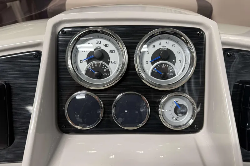 Slide: The Image of Dashboard of 2026 Sylvan Mirage X3 CLZ DH with speedometer and fuel gauge. - 13