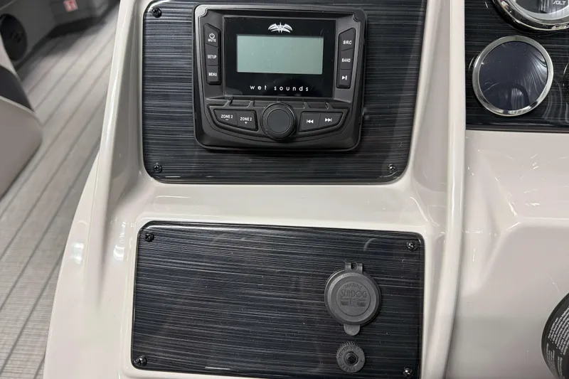 Slide: The Image of Dashboard of 2026 Sylvan Mirage X3 CLZ DH with audio controls and gauges. - 14