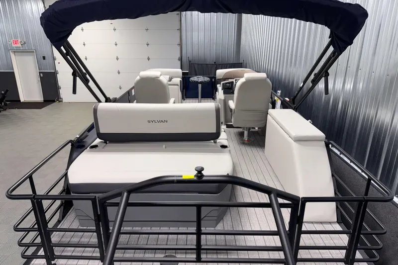 Slide: The Image of 2026 Sylvan Mirage X3 CLZ DH pontoon boat interior with seating and canopy. - 17