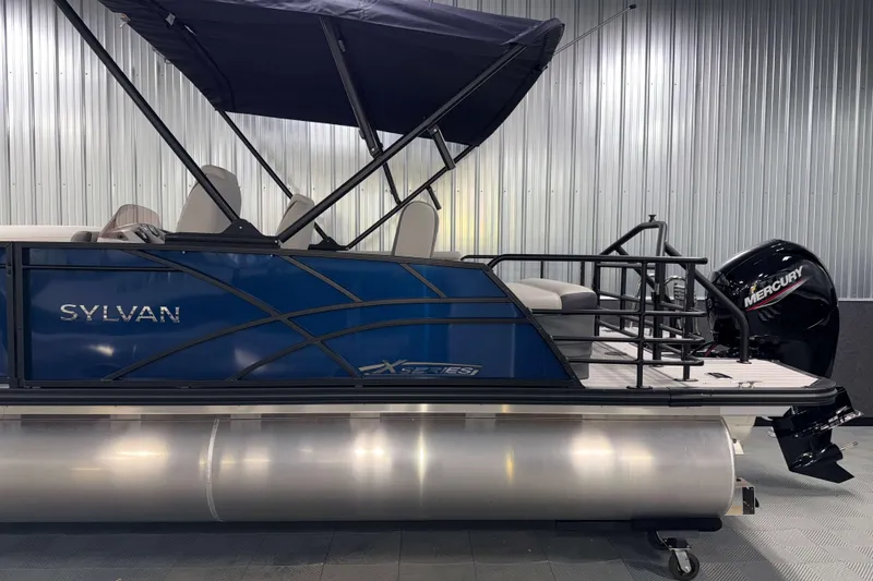 Slide: The Image of 2026 Sylvan Mirage X3 CLZ DH pontoon boat with Mercury outboard motor. - 23