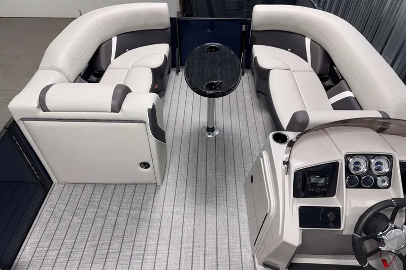 Slide: The Image of Luxurious interior of 2026 Sylvan Mirage X3 CLZ DH pontoon boat with plush seating and modern dashboard. - 4
