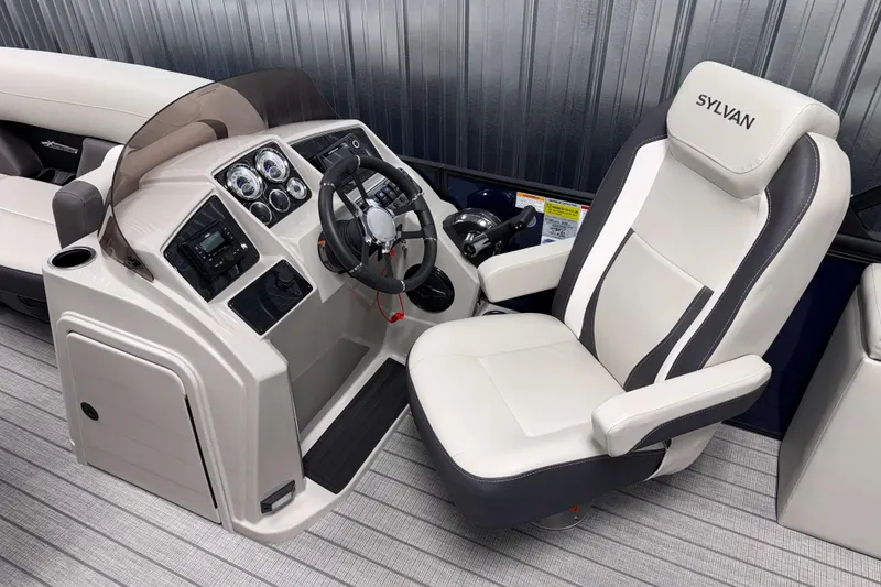 Slide: The Image of 2026 Sylvan Mirage X3 CLZ DH boat cockpit with modern steering and controls. - 9