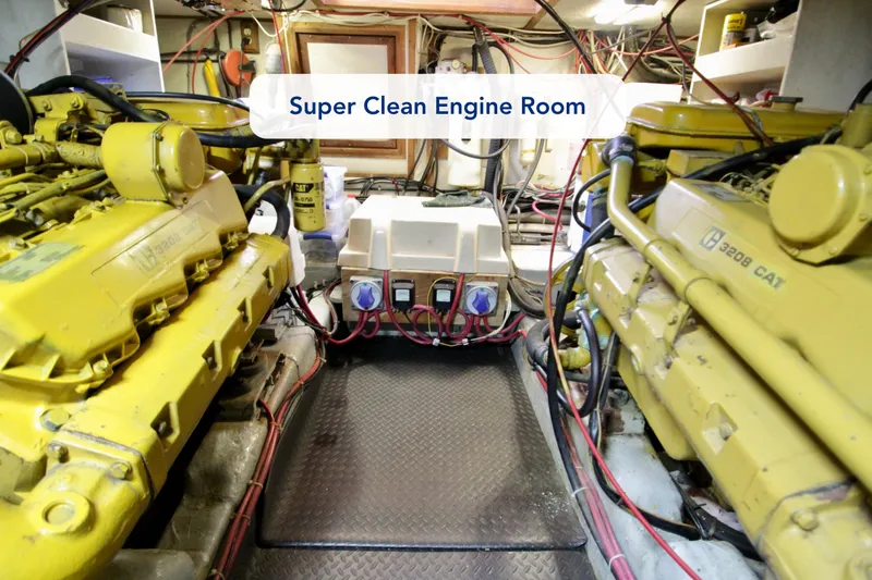 Slide: The Image of Super clean engine room with dual yellow engines, Symbol 51, 1984 model. - 37