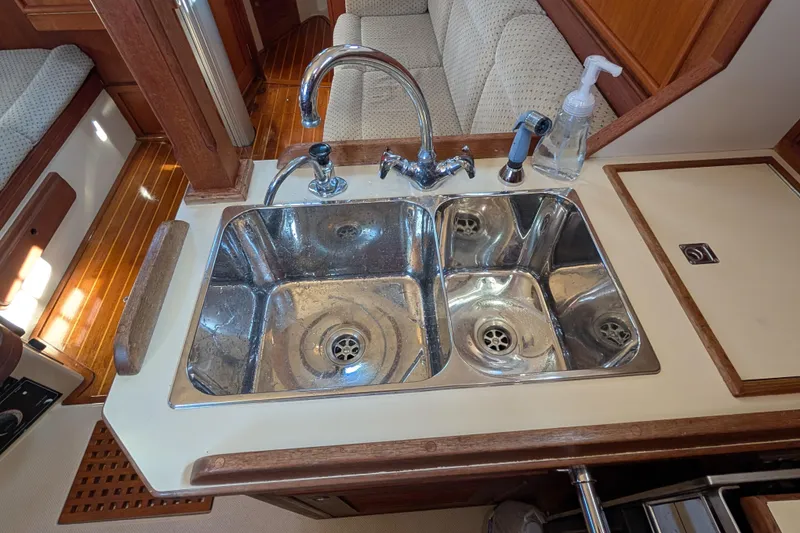 Slide: The Image of Dual stainless steel sink in 1999 Island Packet 320 yacht kitchen. - 12