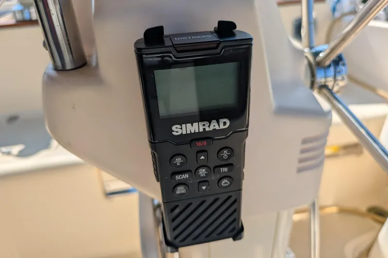 Slide: The Image of Simrad marine radio on 1999 Island Packet 320 sailboat helm. - 25