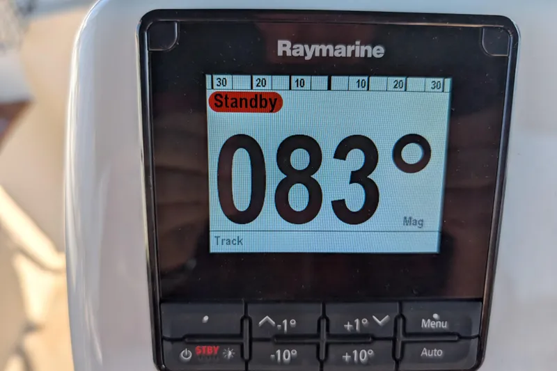 Slide: The Image of Raymarine display showing 083° heading on Island Packet 320, 1999 model. - 27