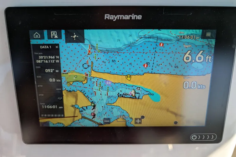 Slide: The Image of Raymarine navigation display on 1999 Island Packet 320, showing nautical chart and depth of 6.6 feet. - 28