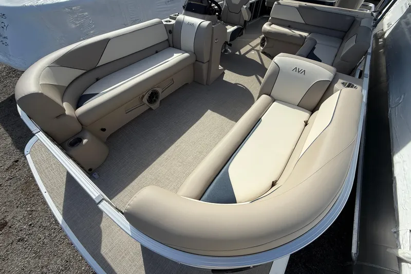 Slide: The Image of 2026 Avalon Venture 85 Rear Fish pontoon boat with luxurious beige seating. - 12