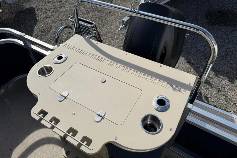 Slide: The Image of 2026 Avalon Venture 85 Rear Fish boat with fishing station and cup holders. - 13