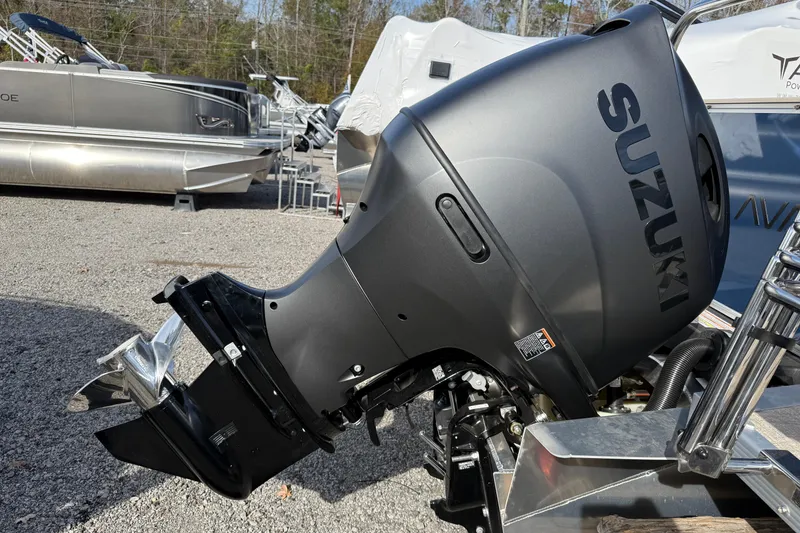Slide: The Image of Outboard motor on 2026 Avalon Venture 85 Rear Fish boat, featuring Suzuki branding. - 16