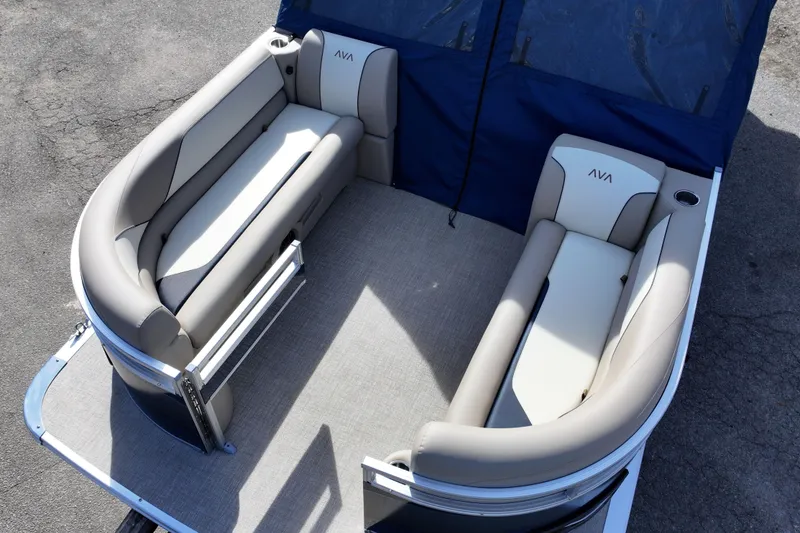 Slide: The Image of 2026 Avalon Venture 85 Rear Fish boat interior with beige seating and blue cover. - 3