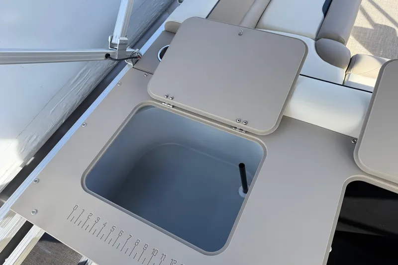 Slide: The Image of 2026 Avalon Venture 85 Rear Fish boat with open storage compartment and seating. - 8