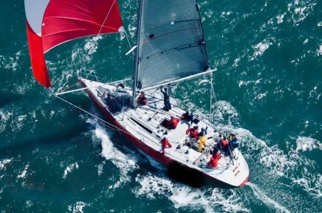 The Image of Sailing yacht Davidson 44, 1980 model, cruising on open ocean under clear skies. - 0
