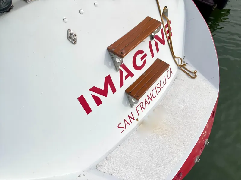 Slide: The Image of Davidson 44 sailboat named "Imagine" docked in San Francisco, CA, 1980 model. - 25