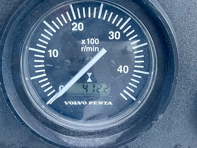 Slide: The Image of Volvo Penta tachometer displaying 412.2 RPM on a Davidson 44, 1980 model. - 23