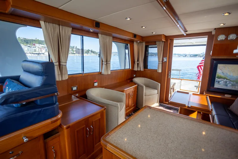 Slide: The Image of Luxurious interior of 2006 Grand Banks 47 Europa yacht with scenic water views. - 12