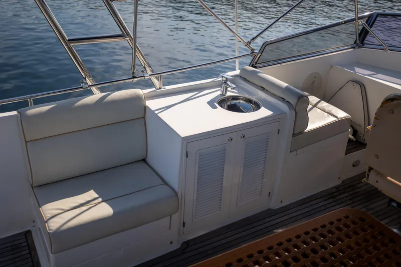 Slide: The Image of Luxury seating and sink area on 2006 Grand Banks 47 Europa yacht deck. - 45