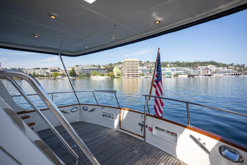 Slide: The Image of 2006 Grand Banks 47 Europa yacht deck with city waterfront view. - 47