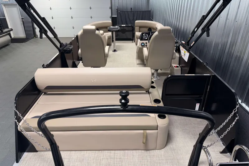 Slide: The Image of 2026 Premier 200 Sunscape RL pontoon boat interior with beige seating and modern design. - 10