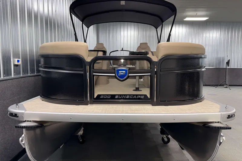 Slide: The Image of 2026 Premier 200 Sunscape RL pontoon boat in a showroom setting. - 3