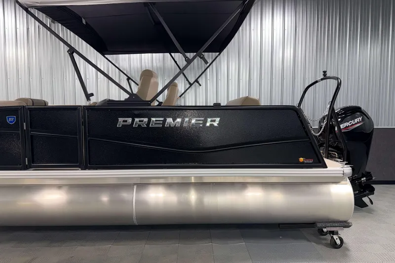 Slide: The Image of 2026 Premier 200 Sunscape RL pontoon boat with Mercury engine in showroom. - 6