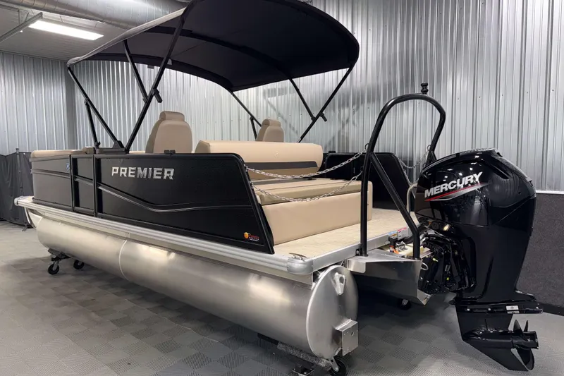 Slide: The Image of 2026 Premier 200 Sunscape RL pontoon boat with Mercury outboard motor in a showroom. - 7