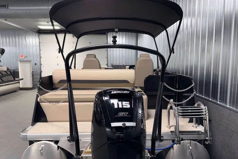 Slide: The Image of 2026 Premier 200 Sunscape RL pontoon boat with Mercury 115 engine in showroom. - 8