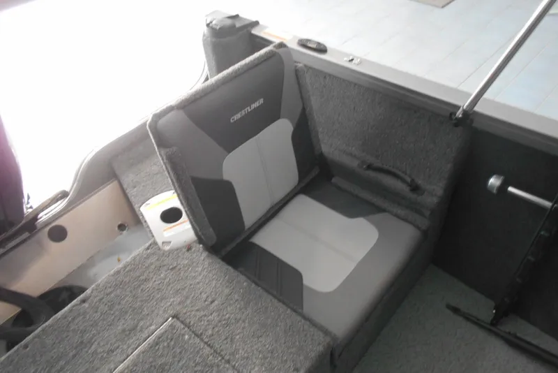 Slide: The Image of 2021 Crestliner 1650 Fish Hawk WT JS boat interior with cushioned seating. - 14