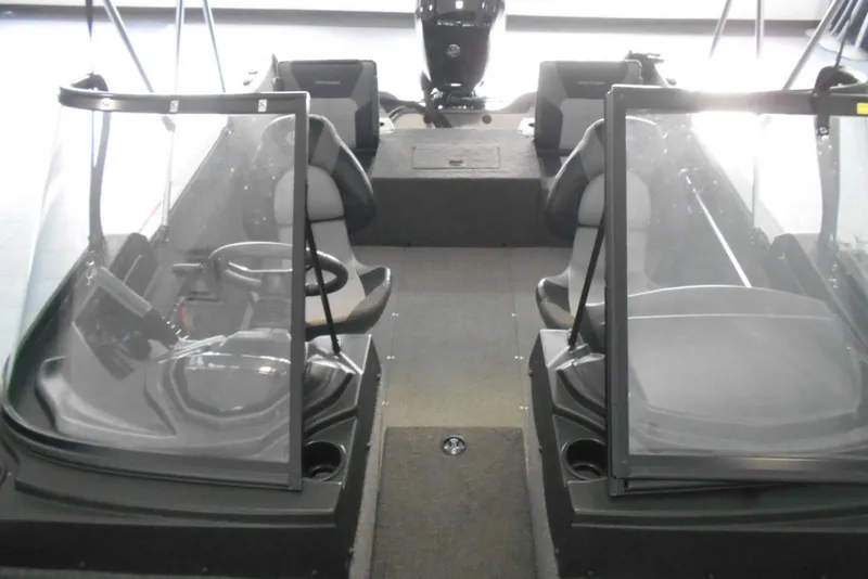 Slide: The Image of 2021 Crestliner 1650 Fish Hawk WT JS interior with dual consoles and seating. - 4