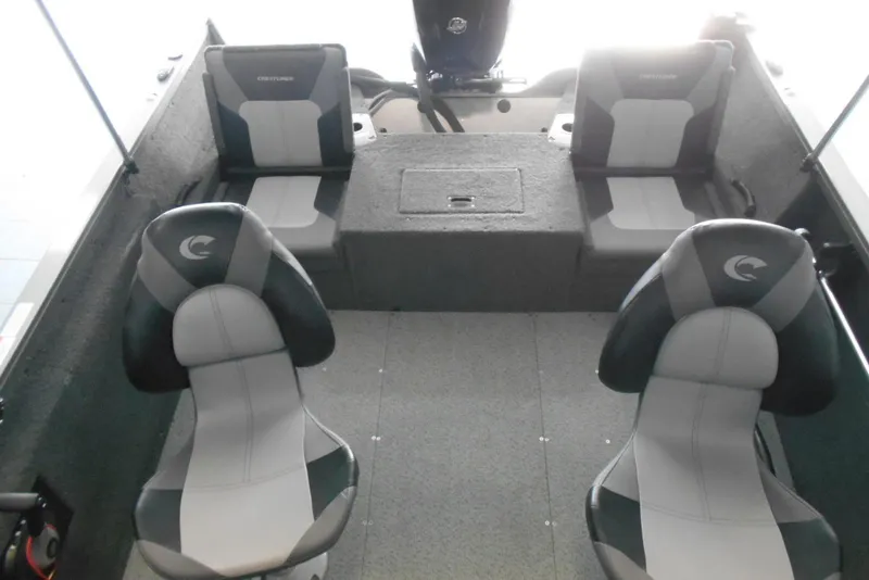 Slide: The Image of 2021 Crestliner 1650 Fish Hawk WT JS interior with four seats and carpeted flooring. - 6