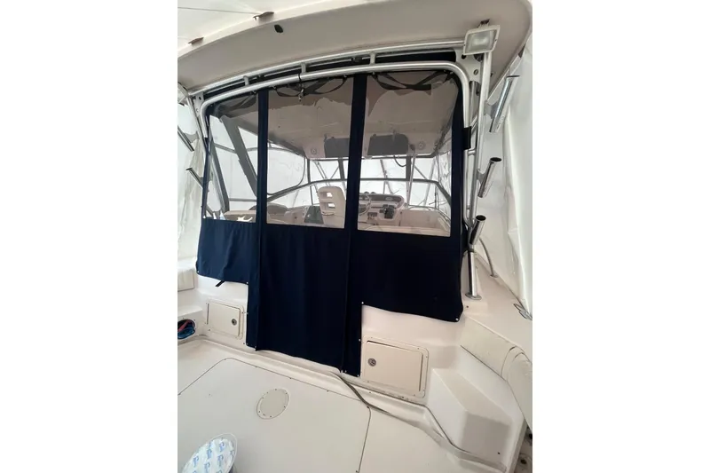 Slide: The Image of 2007 Grady-White Express 330 boat interior with covered cockpit area. - 8
