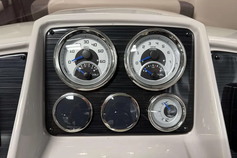 Slide: The Image of Dashboard of 2026 Sylvan MIRAGE X3 DLZ BAR with speedometer and fuel gauges. - 11