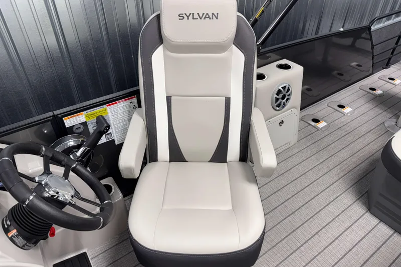 Slide: The Image of Captain's chair on 2026 Sylvan MIRAGE X3 DLZ BAR boat, featuring sleek design and modern controls. - 8