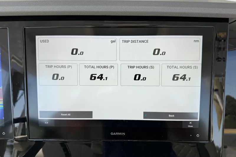 Slide: The Image of 2024 Pursuit S 328 Sport dashboard display showing trip and total hours. - 42