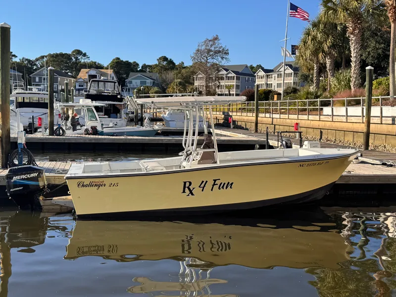 The Image of 1988 KenCraft Challenger 215 boat docked, featuring "RX 4 Fun" text, calm marina setting. - 0