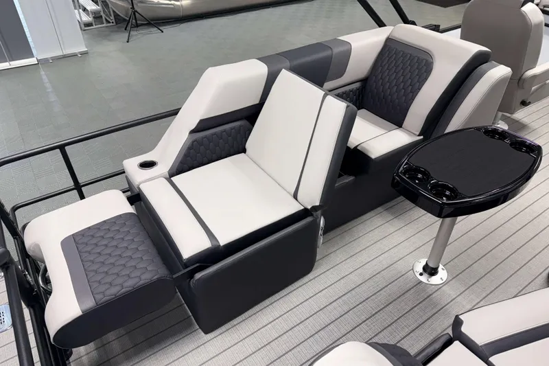 Slide: The Image of Luxurious seating on 2026 Sylvan L3 LZ boat with modern design and cup holders. - 20