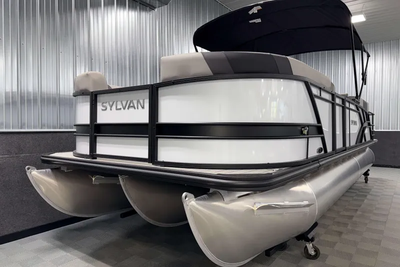 Slide: The Image of 2026 Sylvan L3 LZ pontoon boat in a showroom with sleek design and modern features. - 24